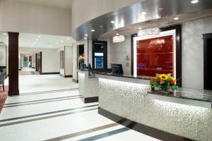 a lobby of a hotel with a reception counter at Residence Inn by Marriott Orangeburg in Orangeburg +53 photos