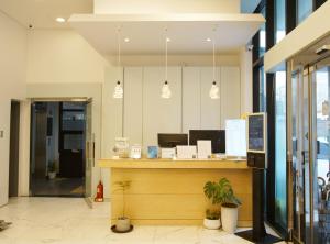 a lobby with a counter in a building at Hotel Dada Gyeongbokgung in Seoul
