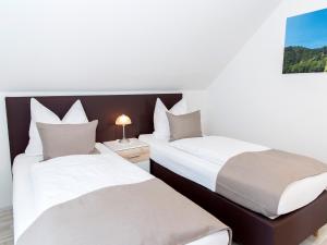 Postel nebo postele na pokoji v ubytování Ferienhaus Kleindienst + 13 fotografií