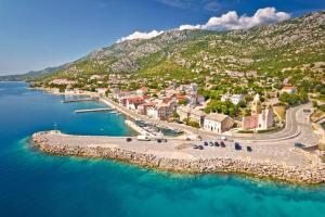 an aerial view of a small island in the water at Apartments Karlobag - Velebit Riviera 39571 in Karlobag