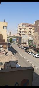 a view of a city street with buildings at Horus key Nile View in Aswan