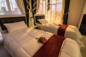 Ein Zimmer in der Unterkunft Al Mawaleh Furnished Flats & Rooms