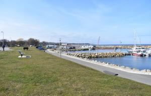 a marina with a bunch of boats in the water at Beautiful Home In Simrishamn in Simrishamn