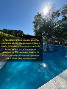a picture of a swimming pool with the wordsustainable chlorine canume many ecological substances at La casa de Yaya in Puerto Escondido