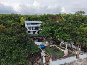 an aerial view of a building in the woods at Bohol Panglao Paradise Villa in Panglao Island