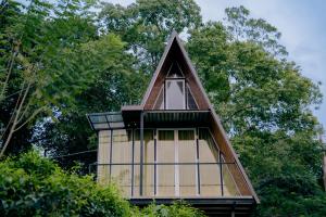 a tower with a steeple on top of a building at Nagalakanda Eco Lodge in Millewa