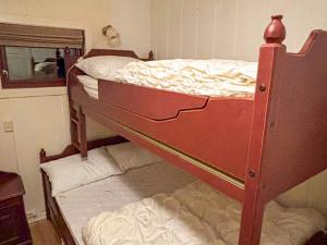 a couple of bunk beds in a room at 5 person holiday home in Røros in Røros