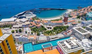 an aerial view of a resort with a pool and a beach at Love & Peace Apartment in Phú Quốc