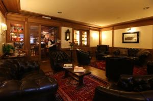 Χώρος καθιστικού στο Alpen Suite Hotel