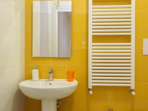 a bathroom with a sink and a mirror at Affittacamere 1888 in Pietrelcina
