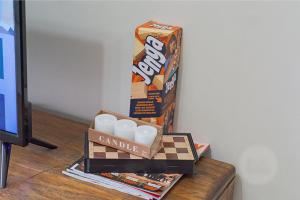 a box of candies sitting on top of a table at Calmwood Stay in Midrand
