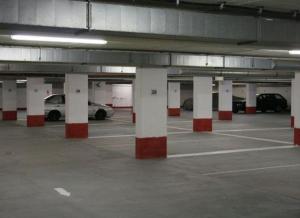 an empty parking garage with cars parked in it at Hotel Pause - Free WiFi & Free Parking!! in Hofheim am Taunus