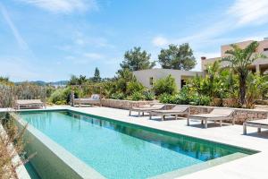 an image of a swimming pool at a house at Villa Sirio in Cala de Bou