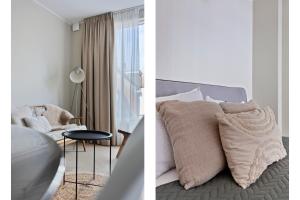 a bedroom with a bed and a room with a window at DuoSuite Sand Vrouwenpolder in Vrouwenpolder