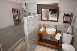 a bathroom with a sink and a mirror at Villa Lilly in Rawai Beach +13 photos