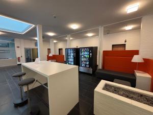 an office with a counter and a bar with a drink at Laerholz 84 in Bochum