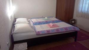 Posteľ alebo postele v izbe v ubytovaní Guesthouse Filepi