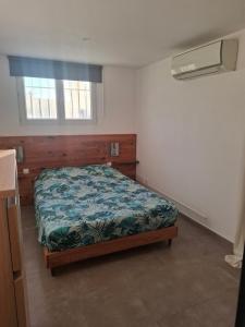 a bedroom with a bed and a window at Flassans Gites &Spa in Flassans-sur-Issole +36 photos