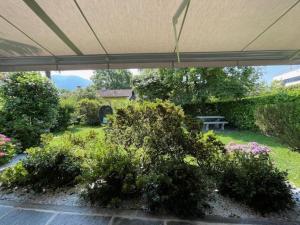 an overhead view of a garden with bushes and trees at Ascona Casa Cristina in Ascona