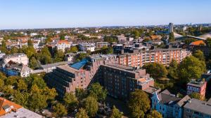 an aerial view of a city with tall buildings at Crowne Plaza Hamburg-City Alster by IHG in Hamburg