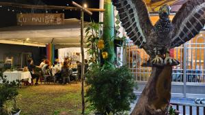 a statue of an owl standing in a restaurant at 那瑪夏Lu-Mah民宿 in Min-tsu