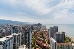 an aerial view of a city with tall buildings at Hotel sea view in Batumi