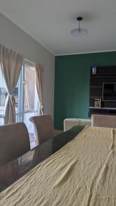 a bedroom with a large bed and a window at San Juan Santo Tome in Santo Tomé