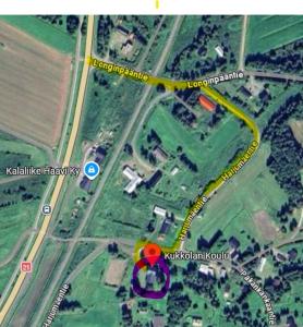 a map of a road with a red circle at Kukkolan koulu in Kukkola