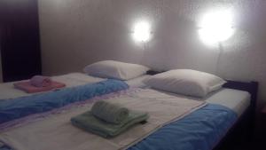 Posteľ alebo postele v izbe v ubytovaní Guesthouse Filepi