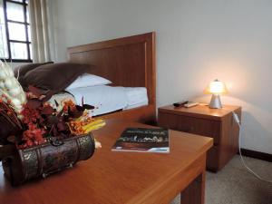 Postel nebo postele na pokoji v ubytování Hotel La Primavera