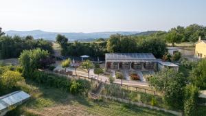 an aerial view of a garden with a building at Semivaganti Agritur in Candelara