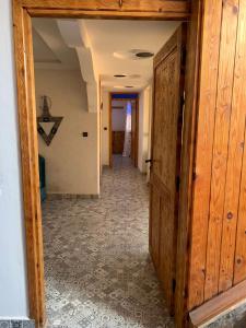 an open door to a hallway in a house at Chez Manon & Said in Tamraght Ouzdar +5 photos