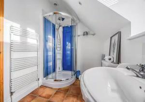 a bathroom with a shower and a sink at Charming Family Stables Conversion - Pass the Keys in Emsworth +20 photos