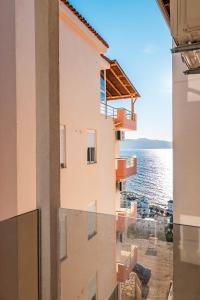 a view of the water from a building at Vila Amare in Sarandë