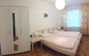 Posteľ alebo postele v izbe v ubytovaní Center Warsaw - Apartament Jana Pawła