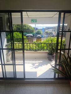 a view from the inside of a building with a balcony at Hotel Gallineral in San Martín