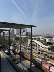 a view of a train station with a train yard at The Sterling Aroma in Greater Noida +5 photos