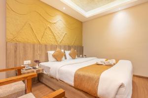 a hotel room with two beds in a room at Divya Boutique Inn in Kathmandu +68 photos