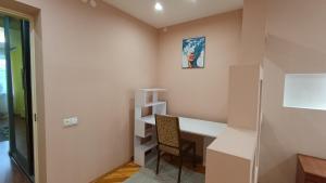 a home office with a desk and a chair at Home for you in Ternopil +3 photos