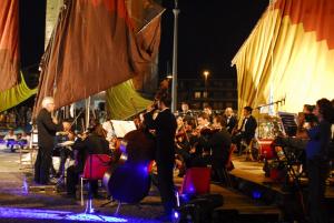 a group of people playing music on a stage at CasaDei Sweet Home Design & Relax - Beach Parking in Cervia