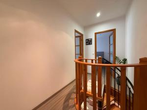 a room with a staircase and a mirror at Villa su in Roquebrune-Cap-Martin