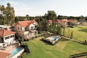 an aerial view of a house with a yard at 1009 Studio Apartment Pont de Val in Parys