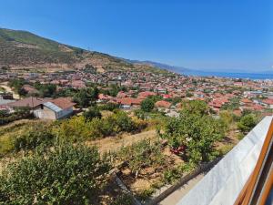 a view of a town from a hill at Vila Topalli in Pogradec