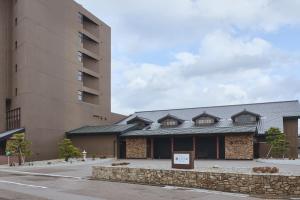a building with a sign in front of it at Hakodate Hotel Banso in Hakodate +110 photos