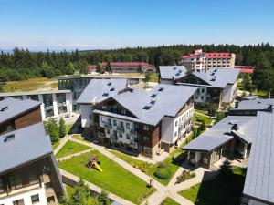 an aerial view of a city with buildings at White & Wood Suite C302, at Euphoria SPA Borovets in Borovets