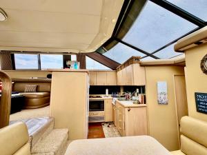 an interior view of a kitchen in a boat at Relation Ship in Onekama