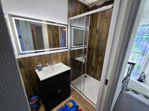 a bathroom with a sink and a shower at The Harbour House - Deluxe Town Centre Property in Rothesay +26 photos