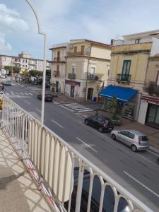 a view of a city street with cars parked at B&B Donna Elvira in Siderno Marina
