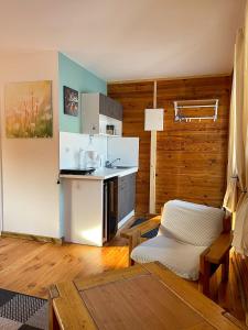 a kitchen with a counter and a sink in a room at HerbergeZumBrieselang in Brieselang +18 photos