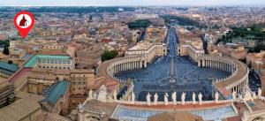 an aerial view of the vatican city with a red arrow at Cameo B&B in Rome +14 photos